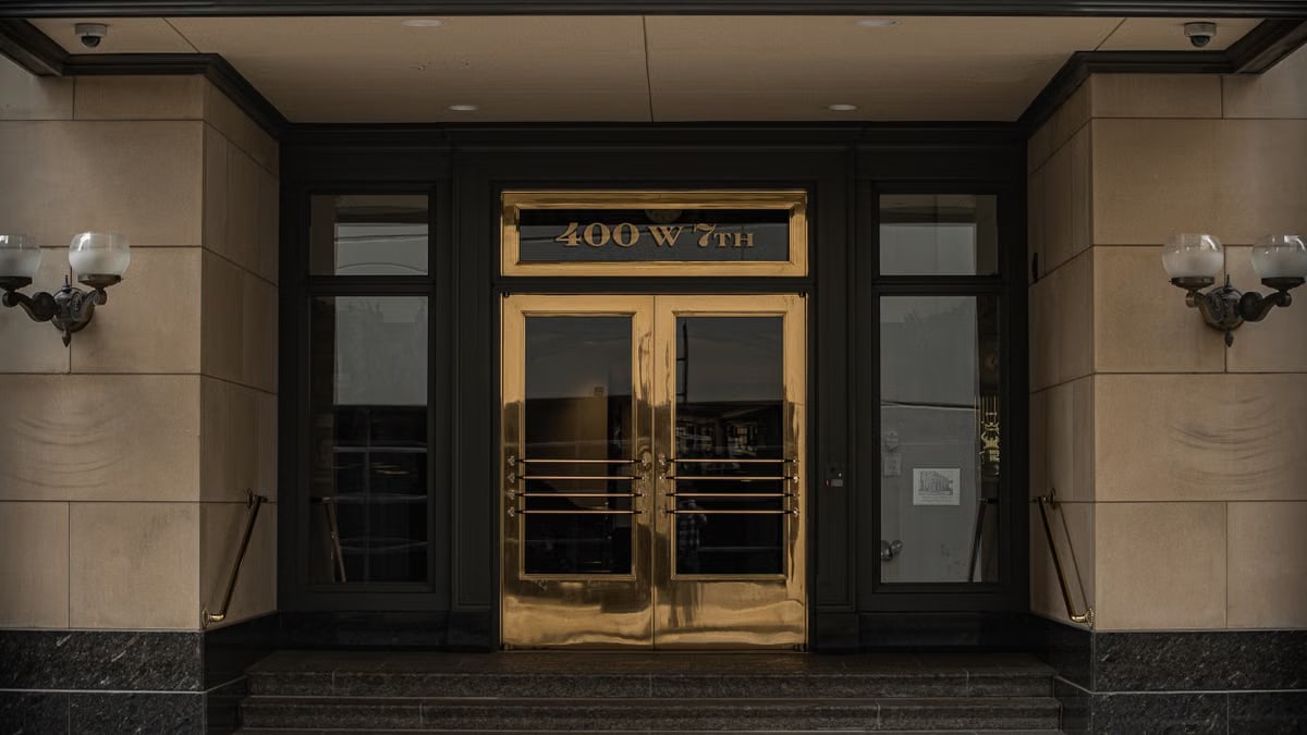 Entrance of MorningStar Oil and Gas at 400 W 7th, depicting a classic and formal architectural style.